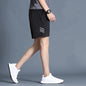 The Performance Flow Summer Shorts: Men's Loose Fit, Mid-Waist Exercise Shorts for Unrestricted Movement