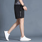 The Performance Flow Summer Shorts: Men's Loose Fit, Mid-Waist Exercise Shorts for Unrestricted Movement