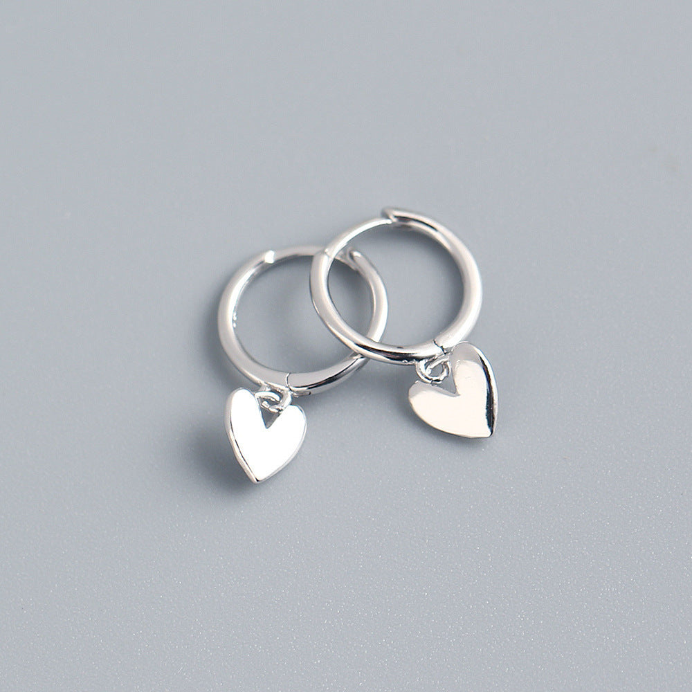 The Premium Love Glow Earrings: Heart-Shaped Hoops for Instant Confidence & Romantic Charm
